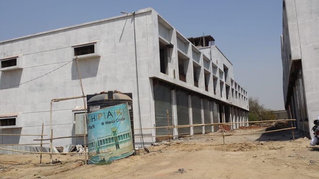 127412_const of real estate project Pushpak Garment Park located at Isanpur, Ahmedabad, Gujarat