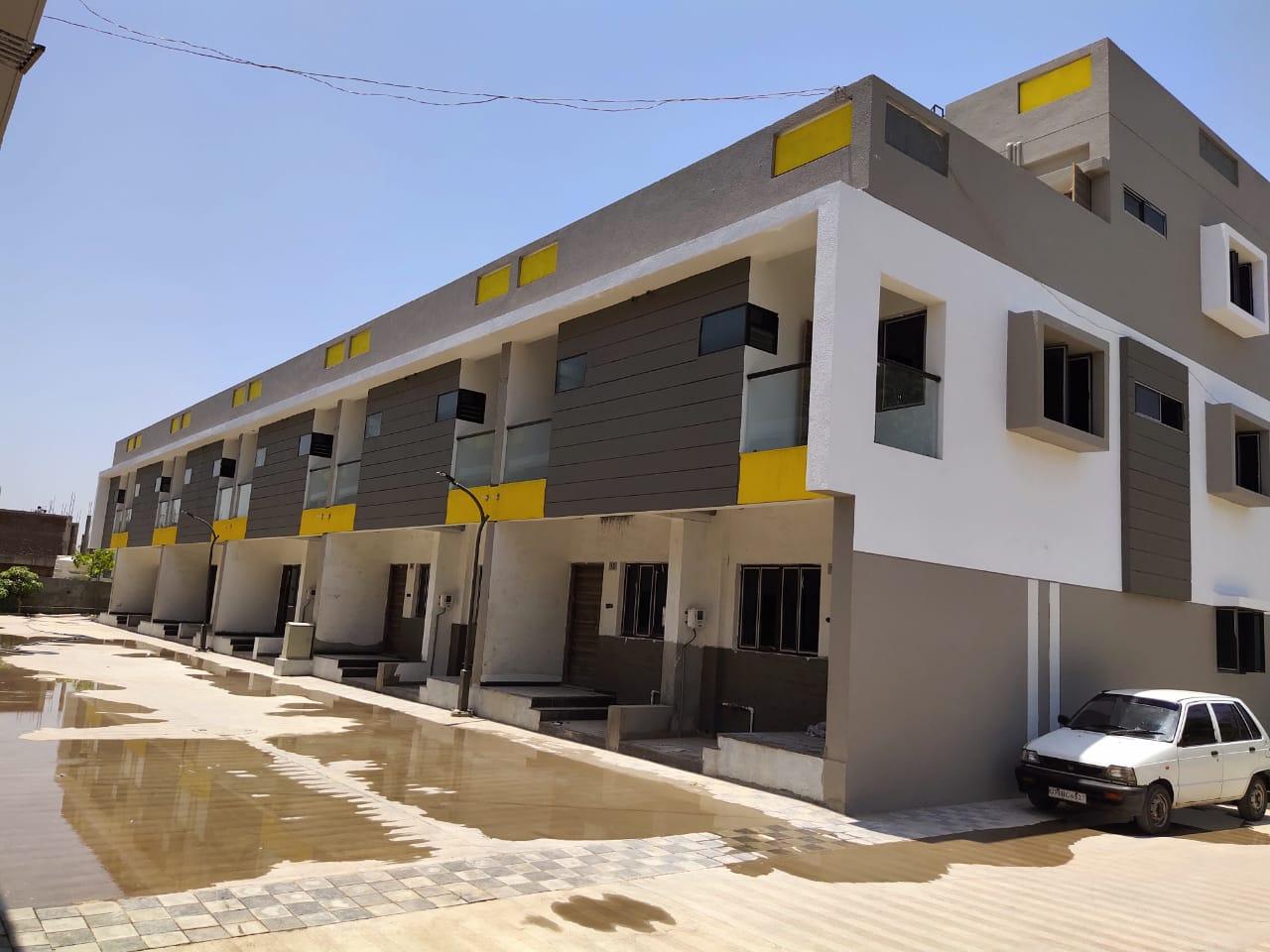 198628_const of real estate project Ramvilla Appts   Raw House Duplex located at Singrva, Ahmedabad, Gujarat