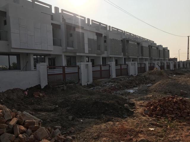 111704_const of real estate project Shivalay Duplex located at Singrva, Ahmedabad, Gujarat