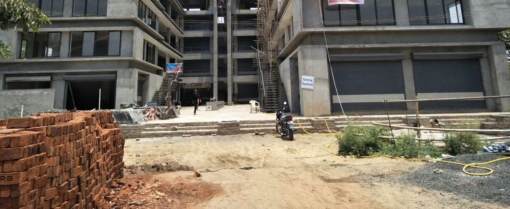 18040_const of real estate project Pramukh Corporate located at Raisan, Gandhinagar, Gujarat