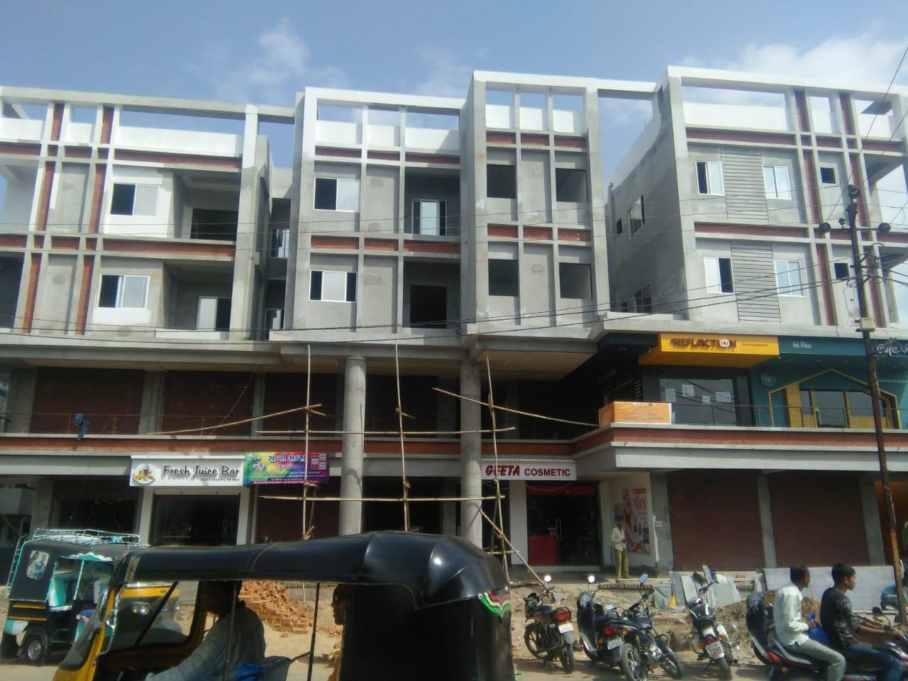 114227_const of real estate project Dhanraj Complex located at Godhara, Panchmahals, Gujarat