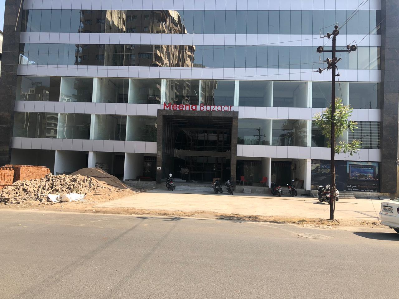 132950_const of real estate project Meena Bazaar located at Pal, Surat, Gujarat