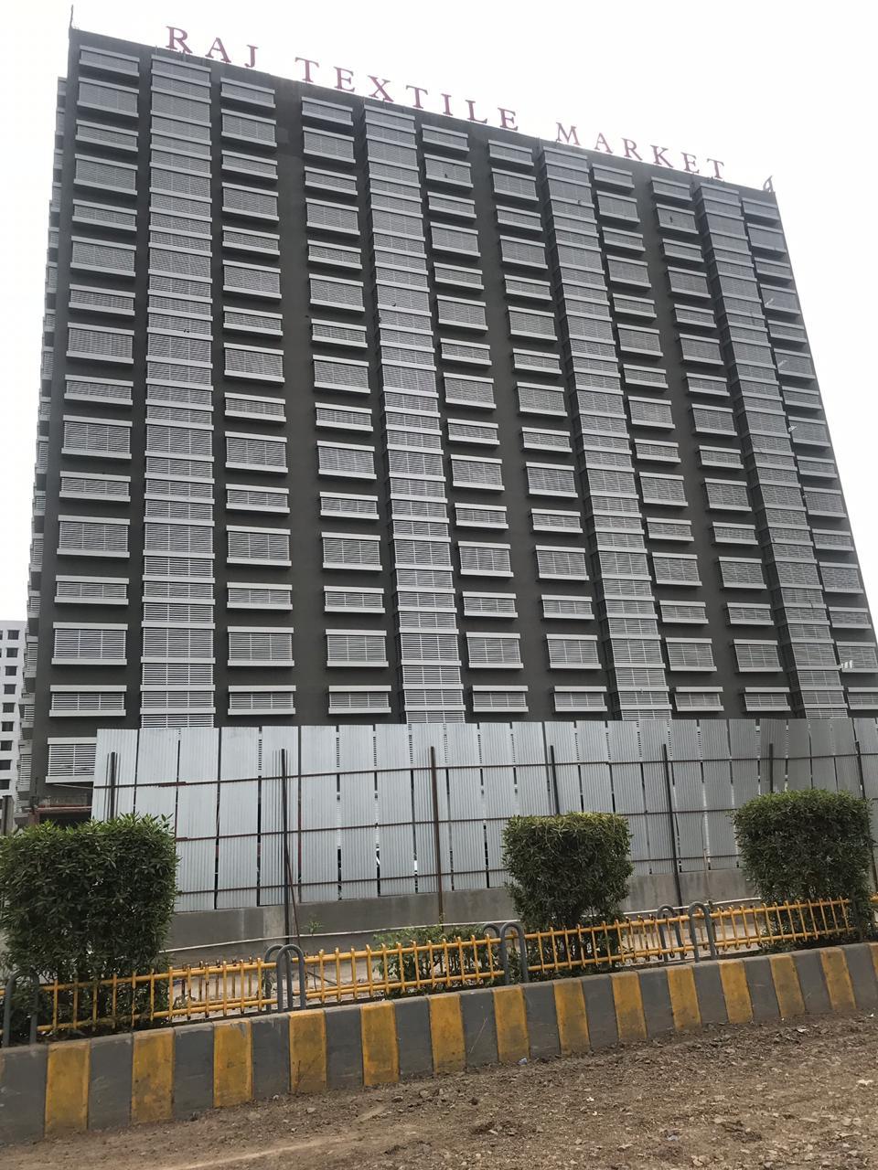 128454_const of real estate project Raj Textile Market located at Parvat, Surat, Gujarat