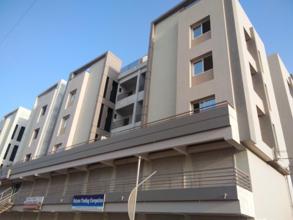 196052_const of real estate project Madhav Resi Cum Plaza located at Sayajipura, Vadodara, Gujarat